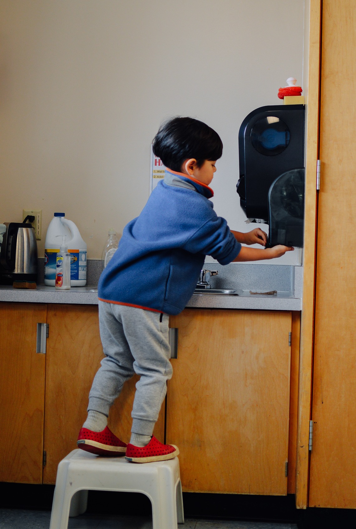 boy washing hands